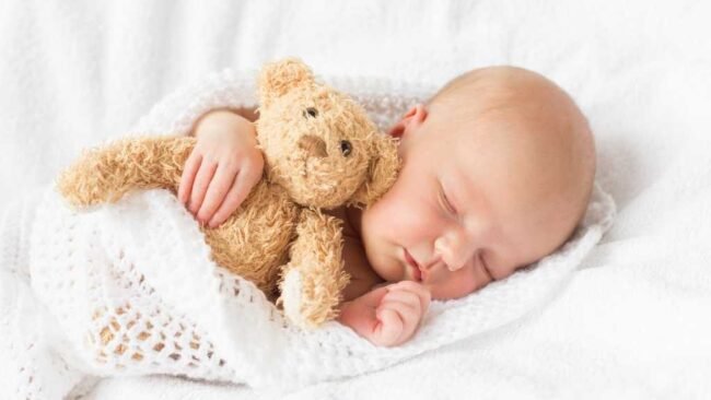 Blog Picture Babies love holding onto soft toys when they sleep.